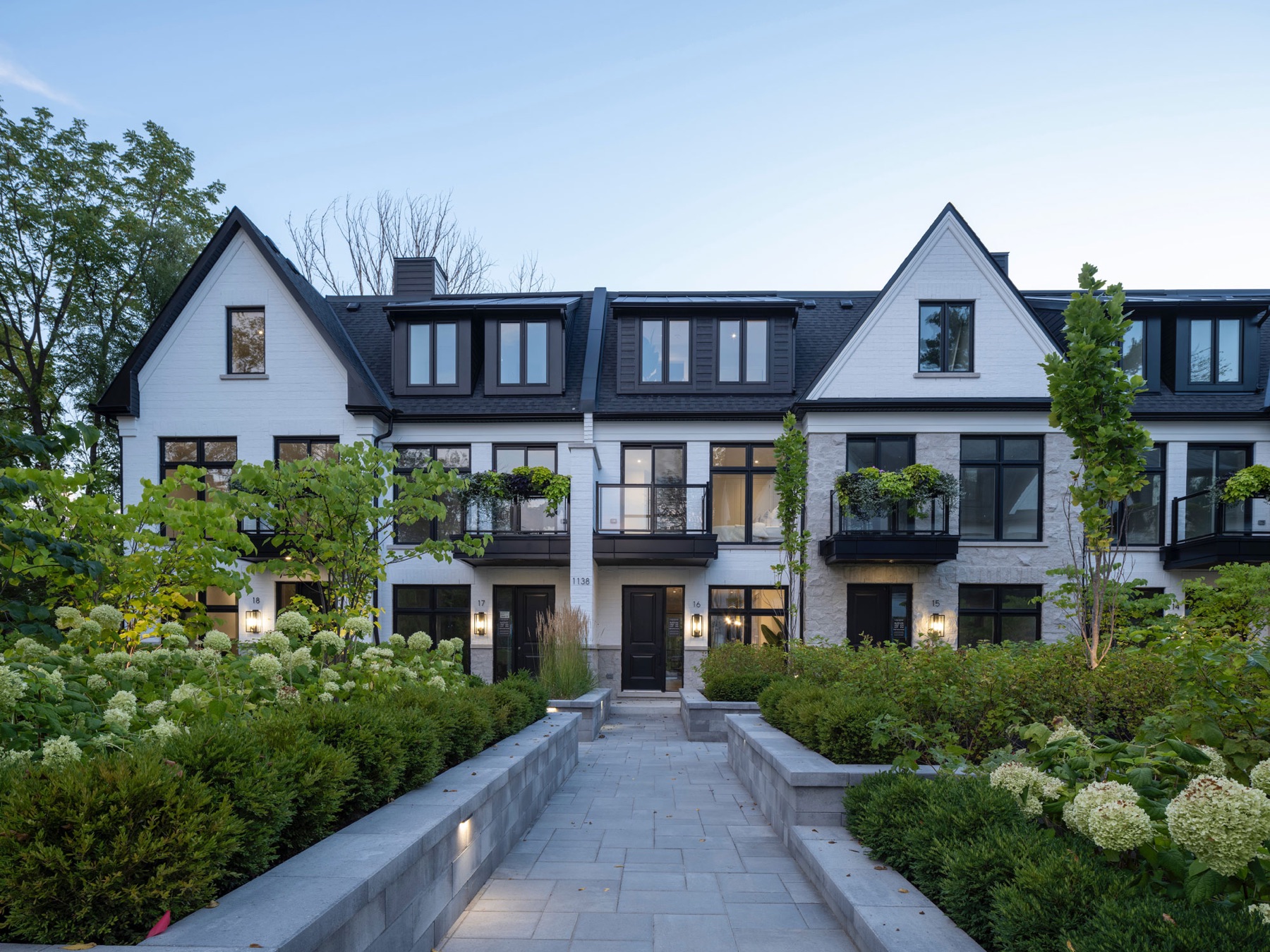 The Lake House townhomes and landscaped entrance